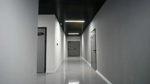 Camera flight forward along the black and white service corridor 스톡 동영상 171593405
