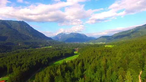 Camera flight over alpine landscape under Zugspitze peak. 스톡 동영상 71976704
