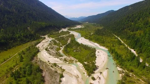 Camera flight over The Isar River in Bavarian Alps. Stock Footage 79711095