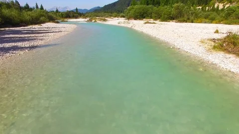 Camera flight over The Isar River in Bavarian Alps. Stock Footage 79713260