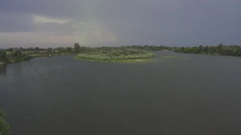 The camera flight over the river in countryside Vídeos de archivo 133024672