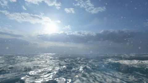 Camera Flight Over Rough Sea Against Blue Sky And Snow Stock Footage 147373193