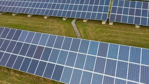 Camera flight over a solar power plant in agricultural landscape. Stock Footage 120122252