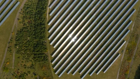 Camera flight over a solar power plant in agricultural landscape. Stock Footage 120122555