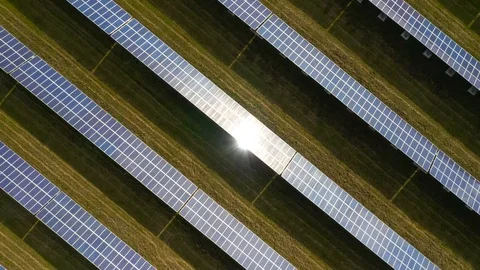 Camera flight over a solar power plant in agricultural landscape. Stock Footage 120123419