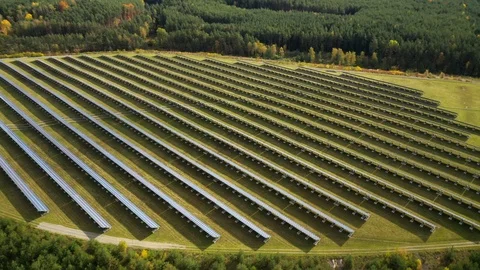 Camera flight over a solar power plant in agricultural landscape. Stock Footage 120123569