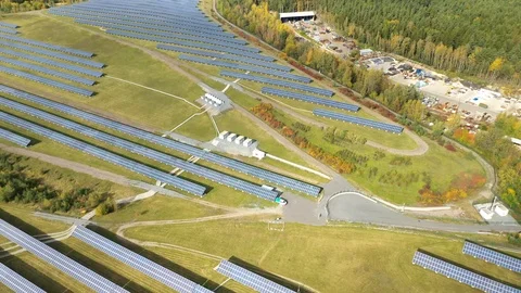 Camera flight over a solar power plant in agricultural landscape. Stock Footage 120123819