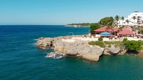 Camera flights over the ocean coast rifs and hotels Stock Footage 101486798