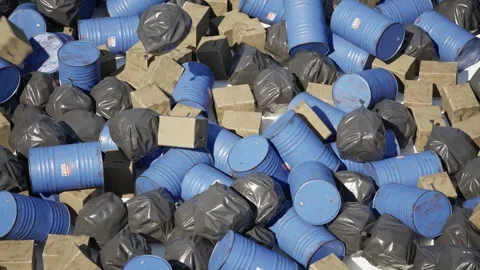 The camera floats over a place where garbage is constantly arriving and it Stock Footage 270197095
