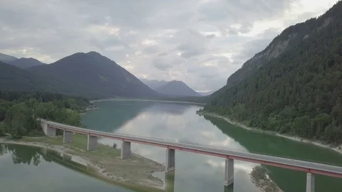 Camera fly above the long bridge in the mountains- Aerial Stock Footage 83740295
