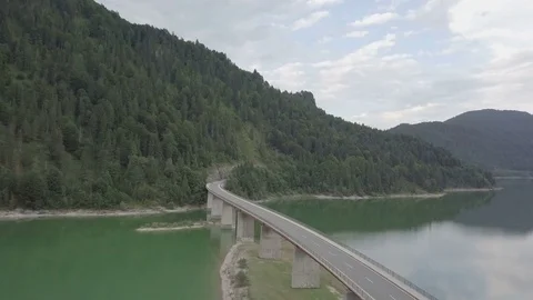 Camera fly along the long bridge in the mountains- Aerial Stock Footage 83739940