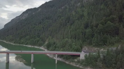 Camera fly next to the long bridge in the mountains- Aerial Stock Footage 83745837