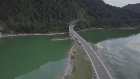 Camera fly on top of the long bridge in the mountains- Aerial Stock Footage 83748547