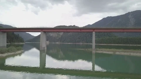 Camera fly underneath the long bridge in the mountains- Aerial Stock Footage 83737670