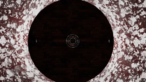 Camera flyby inside a tunnel made of rusty old metal pipe embedded in a brick wa Stock Footage 310507734