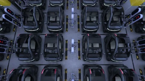 Camera flyies above lots of electric cars at charging station in a parking lot. Stock Footage 226985121