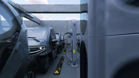 Camera flyies between lots of electric cars at charging station in a parking lot Stock Footage 226984949