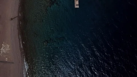 Camera flying along Red Sea beach in Eilat Stock Footage 87912525