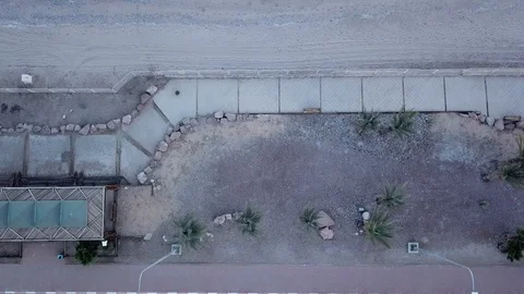 Camera flying along Red Sea beach in Eilat Stock Footage 87912556