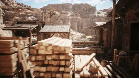 Camera is flying to an old western lumber mill building in a west town village Stock Footage 236395986