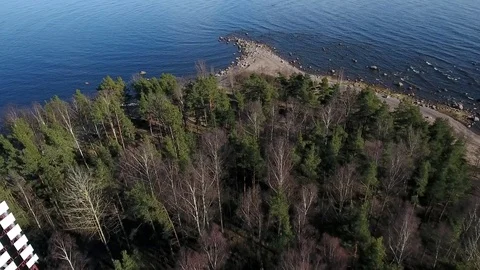Camera flying over beach and seashore of Gulf of Finland. Aerial drone footage. Stock Footage 76178644