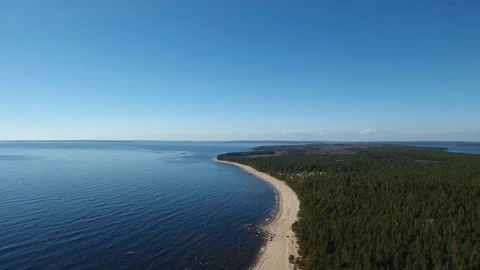 Camera flying over beach and seashore of Gulf of Finland. Aerial drone footage. Stock Footage 76178724