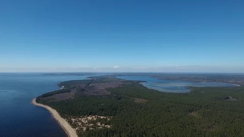 Camera flying over beach and seashore of Gulf of Finland. Aerial drone footage. Video stock 76178774