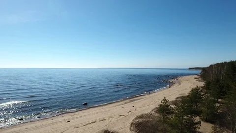 Camera flying over beach and seashore of Gulf of Finland. Aerial drone footage. Stock Footage 76178791