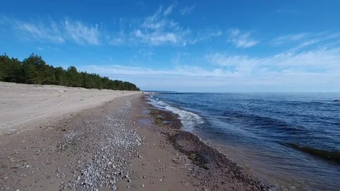 Camera flying over beach and seashore of Gulf of Finland. Aerial drone footage. Stock Footage 76179287