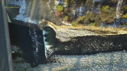 Camera flying over bridge and mountain river. Stock Footage 147631005