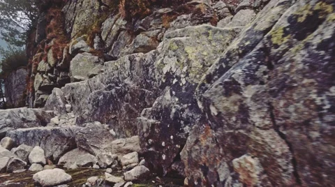 Camera flying over the edge of cliff to the mountain lake view, Stabilized POV. 스톡 동영상 55873552