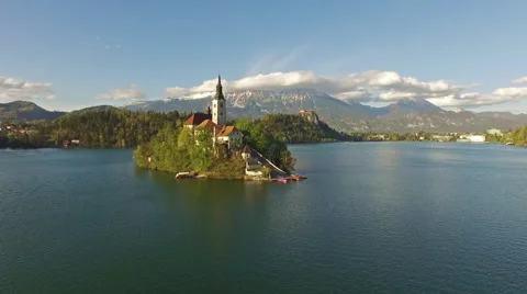 Camera flying over lake in Bled Stock Footage 62449345