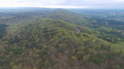 Camera flying over ridge of wilderness Stock Footage 129062353