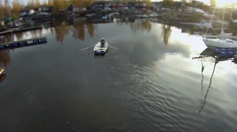 Camera flying  over the rowing boat Stock Footage 57292937