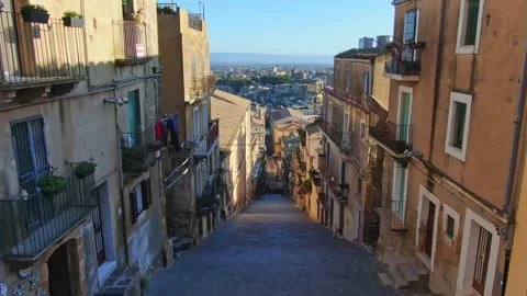 Camera flying over the staircase of Santa Maria del Monte, Caltagirone Sicily Stock Footage 166643860