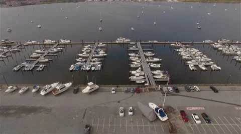 Camera flying over Yachts in Harbor. Staten Island. Great Kills Harbor. Stock Footage 58571078