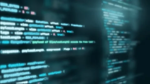 Camera flying through blurred cyan programming code on dark screen 動画素材 347364290