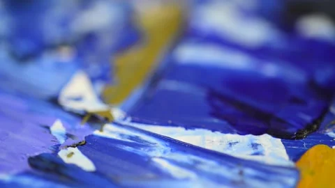 Camera focus moving over abstract mixed oil paint colors Stock Footage 144465357