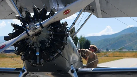 Camera is focusing on the Hamilton Standard propeller and a pilot Stockbeeldmateriaal 115894424