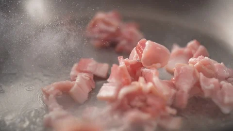 Camera follows adding parsley on cooked clams in a pan. Slow Motion. Stock Footage 104455734