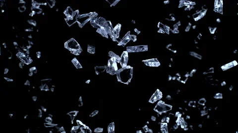 Camera follows broken glasses exploding against black background. Slow Motion. 스톡 동영상 55535333