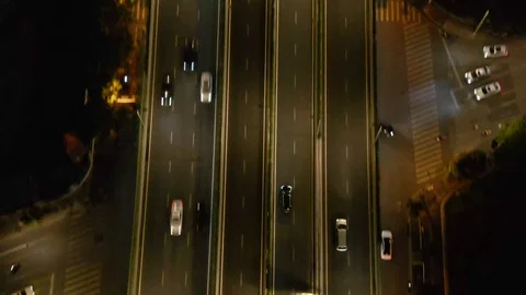 The camera follows a car on the elevated Stock Footage 130063506