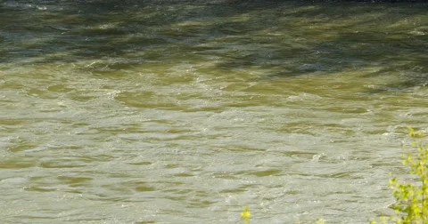 The camera follows the course of the mountain river Stock Footage 63453037