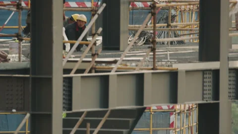 Camera Follows Crane Hook Down Into Construction Site Stock Footage 224327630