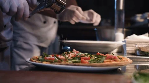 Camera follows parmesan cheese being put on salad. Shot with high speed camera Stock Footage 73839241