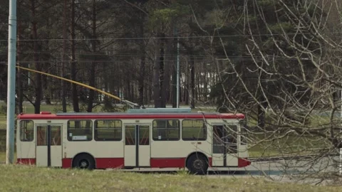 The camera follows the trolley bus. Stock Footage 240507293
