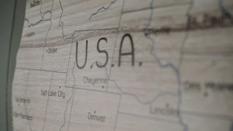 The camera follows the US territory on the wall map Stock Footage 128289604