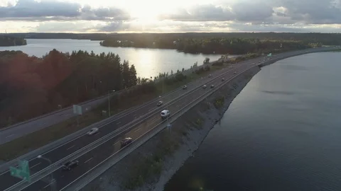 Camera follows the van across the bridge during sunset Video stock 86487437