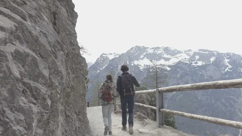 Camera footage couple walk on the pathway with the mountain view Stock Footage 89619650