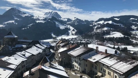 Camera footage of the mountain view over medieval city in the sunny winter day Stock Footage 86996510